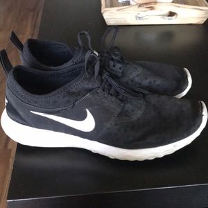 Black Nike running shoes